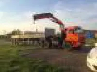 Бортовой автомобиль 6586-401-01 с КМУ Fassi F 195 A.0.25 на шасси Камаз-65117